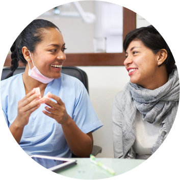 Dentist and patient having a conversation